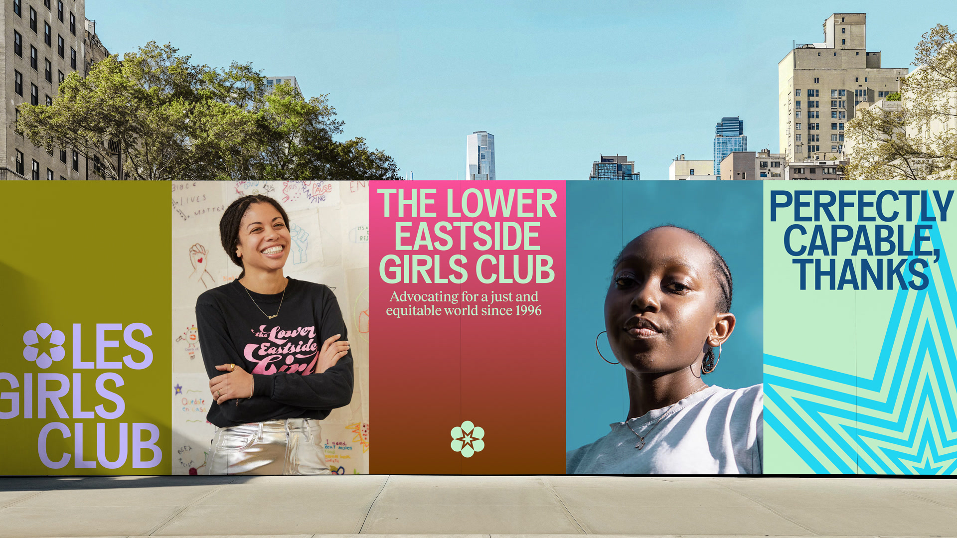 o﻿ut of home consisting of 5 posters, some are logos, some are photos of girls and one says “perfectly capable, thanks”