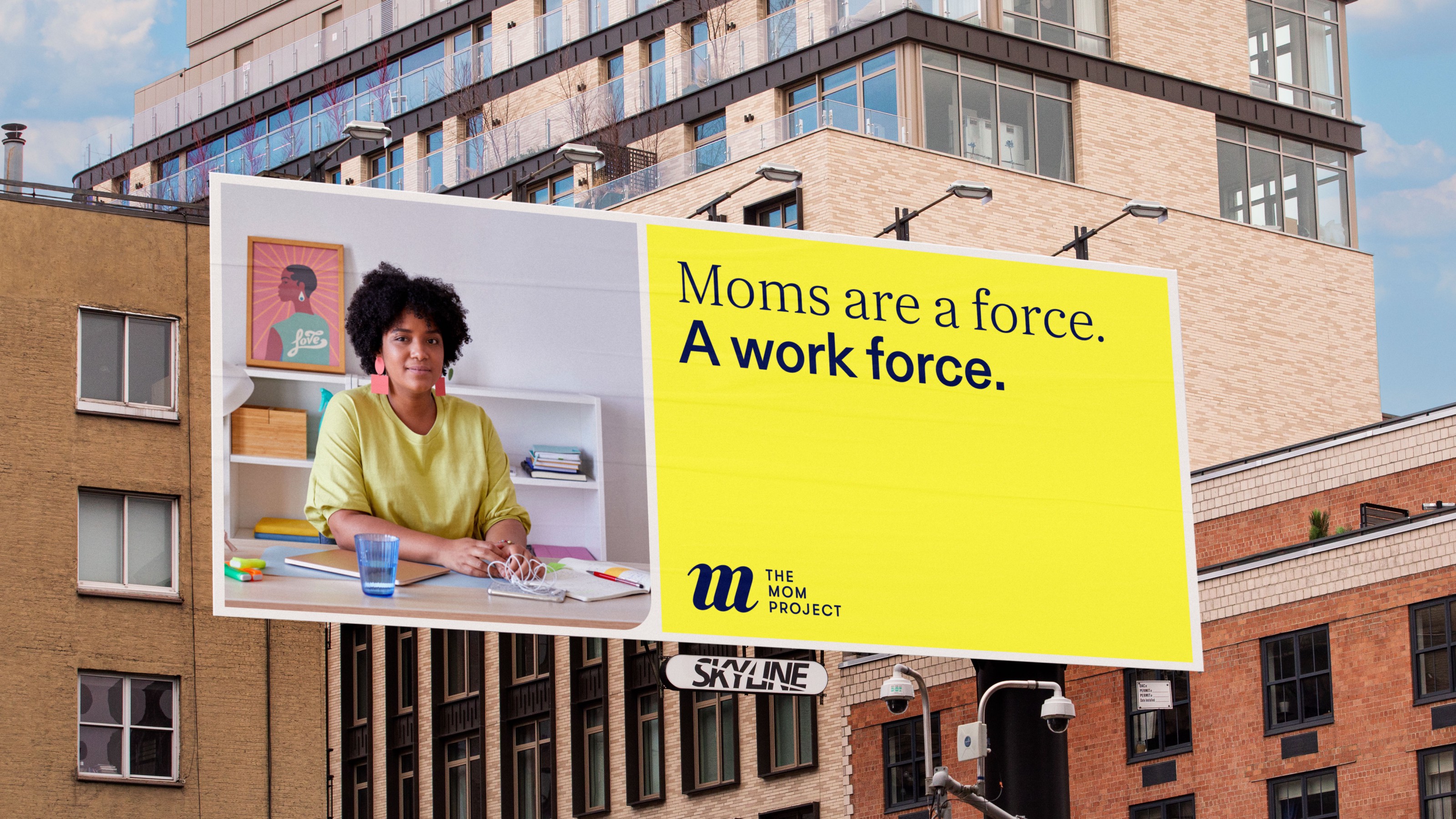 b﻿illboard with photo of a mom next to headline “Moms are a force. A workforce.”